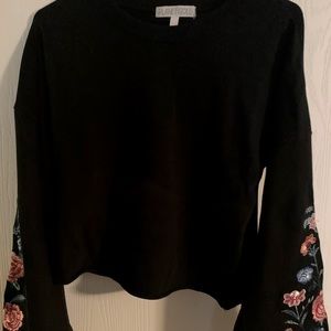 Black bell sleeve embroidered top
